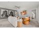 Stylish loft area with plush seating, unique artwork, and contemporary design elements offers a comfortable and visually appealing space at 521 Providence Springs Ln, Fuquay Varina, NC 27526
