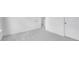 Unfurnished bedroom with neutral carpet and white doors creating a blank canvas for personalization at 631 Contento Ct, Sanford, NC 27330