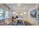 Bright and airy office space featuring large windows and modern decor at 660 Sun Meadow Dr, Wake Forest, NC 27587