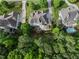 Lovely aerial view of a home showcasing a serene backyard with a pool and entertainment area at 6829 Palaver Ln, Cary, NC 27519