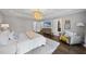 Tranquil bedroom with hardwood floors and ensuite bath and walk-in closet access at 6829 Palaver Ln, Cary, NC 27519