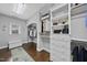 Spacious walk-in closet with custom white shelving and drawers for organized storage at 6829 Palaver Ln, Cary, NC 27519