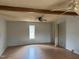 Bedroom with hardwood floors, ceiling fan, and natural lighting at 731 Latimer St, Hillsborough, NC 27278