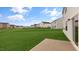 Large backyard featuring a patio and ample green space at 83 Paper Birch Way, Fuquay Varina, NC 27526