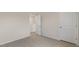 Neutral bedroom with carpet and a glimpse of a walk-in closet at 83 Paper Birch Way, Fuquay Varina, NC 27526