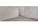 Spacious bedroom featuring neutral carpet and crisp white trim at 83 Paper Birch Way, Fuquay Varina, NC 27526