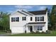 Charming two-story home boasts a clean white exterior, black shutters, and an integrated two-car garage at 83 Paper Birch Way, Fuquay Varina, NC 27526
