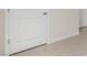 Close-up view of doors and carpet in a hallway at 83 Paper Birch Way, Fuquay Varina, NC 27526