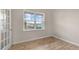 Well lit office space with hardwood floors, white trim and a window to the outside at 83 Paper Birch Way, Fuquay Varina, NC 27526