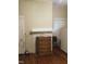Bedroom featuring a chest of drawers, small fireplace and doorway at 925 Harris St, Burlington, NC 27217
