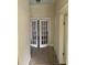 Hallway view featuring vintage doors that lead to other rooms at 925 Harris St, Burlington, NC 27217