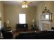 Cozy living room featuring a fireplace and natural light at 925 Harris St, Burlington, NC 27217