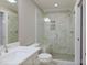Stylish bathroom featuring a glass enclosed shower with marble tile surround at 93 Shoreline Dr, Princeton, NC 27569