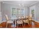 Cozy dining area with a light-colored table, chairs, and natural lighting at 93 Shoreline Dr, Princeton, NC 27569