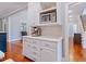 A well-appointed kitchen includes a microwave and coffee machine setup at 93 Shoreline Dr, Princeton, NC 27569