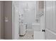 Well-organized laundry room with ample storage, countertop space, and modern appliances for convenience at 93 Shoreline Dr, Princeton, NC 27569
