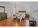 Bright main bedroom with natural light, hardwood floors and sitting area at 93 Shoreline Dr, Princeton, NC 27569