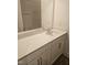 Bathroom featuring a long vanity with white cabinets and a large mirror at 104 Lavender Ln, Clayton, NC 27520