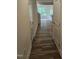 Hallway showcasing wood-look flooring and access to the home's interior spaces at 104 Lavender Ln, Clayton, NC 27520