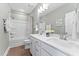 Clean bathroom features a double sink vanity, tub-shower combo, and neutral tones for a spa-like feel at 10531 Pleasant Branch Dr # 201, Raleigh, NC 27614