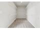 Spacious walk-in closet with carpeted floor and multiple rows of wire shelving at 10531 Pleasant Branch Dr # 201, Raleigh, NC 27614