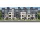 New townhome row showcases gray siding and brick facade, enhancing curb appeal at 10533 Pleasant Branch Dr # 201, Raleigh, NC 27614