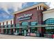Exterior shot of Harris Teeter grocery store, showing the building's facade and entrance at 10533 Pleasant Branch Dr # 201, Raleigh, NC 27614