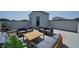 Inviting rooftop deck with modern outdoor seating, perfect for relaxation and entertaining guests at 10533 Pleasant Branch Dr # 201, Raleigh, NC 27614