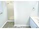 Bathroom with a shower, toilet, and vanity with modern fixtures at 1125 Field Meadows Dr, Zebulon, NC 27597