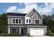 Charming two-story home features a gray exterior, covered porch, and an attached two-car garage at 117 N Stonemill Trl # Homesite 290, Clayton, NC 27520