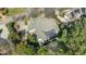 An aerial view of a luxurious home featuring professionally landscaped grounds at 12417 Richmond Run Dr, Raleigh, NC 27614