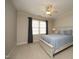 Bedroom with a ceiling fan, neutral paint and carpet, and large windows at 12417 Richmond Run Dr, Raleigh, NC 27614