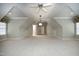 Large bonus room with neutral paint, recessed lighting and multiple windows at 12417 Richmond Run Dr, Raleigh, NC 27614