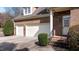 Attached two car garage with brick exterior and short driveway at 12417 Richmond Run Dr, Raleigh, NC 27614