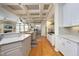 Open kitchen with granite countertops, stainless steel appliances, and a view of living spaces at 12417 Richmond Run Dr, Raleigh, NC 27614