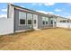 Backyard featuring a fenced in yard and well-maintained lawn at 133 Alumroot Road Rd, Holly Springs, NC 27540