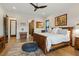 Comfortable primary bedroom featuring wood floors and a ceiling fan at 1354 Briar Chapel Pkwy, Chapel Hill, NC 27516