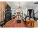 Stylish living room featuring a fireplace, contemporary light fixture, and inviting seating area at 1354 Briar Chapel Pkwy, Chapel Hill, NC 27516