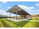 Community pavilion with picnic tables and grill at 1354 Briar Chapel Pkwy, Chapel Hill, NC 27516