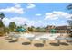 Community pool with lounge area, a slide, and tables at 1354 Briar Chapel Pkwy, Chapel Hill, NC 27516