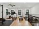 Spacious workout room with hardwood floors, weights, and plenty of natural light at 1354 Briar Chapel Pkwy, Chapel Hill, NC 27516