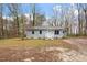 Charming exterior of a well-maintained home with ample yard space at 136 Dixie Ln, Youngsville, NC 27596