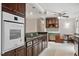 Eat-in kitchen featuring a built-in oven, custom cabinetry, and a breakfast nook with built-in seating at 136 Dixie Ln, Youngsville, NC 27596
