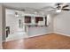Open-concept layout with a view of the kitchen and breakfast bar at 136 Dixie Ln, Youngsville, NC 27596