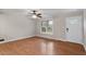 Spacious living room featuring hardwood floors and neutral wall colors at 136 Dixie Ln, Youngsville, NC 27596