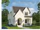 Charming two-story home with brick and white siding, arched entry, and well-manicured lawn at 1608 Scales St, Raleigh, NC 27608