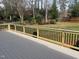 Spacious back deck overlooking the property's large, fenced-in backyard, ideal for relaxing and outdoor entertainment at 2112 Hamrick Dr, Raleigh, NC 27615