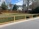 View from back deck of the property's spacious fenced-in backyard, perfect for outdoor activities and privacy at 2112 Hamrick Dr, Raleigh, NC 27615
