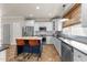 Well-equipped kitchen with an island and stainless steel appliances at 2118 Cloud Cover Ln, Raleigh, NC 27614