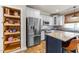 Beautiful kitchen with pantry, stainless steel appliances, and center island at 2118 Cloud Cover Ln, Raleigh, NC 27614